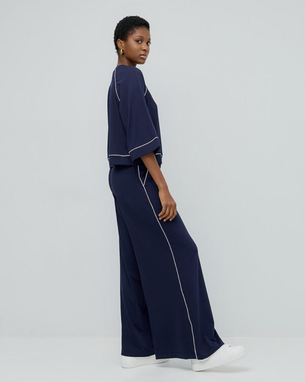 Pants with an elastic waist and piping details - Access Fashion - Image 3