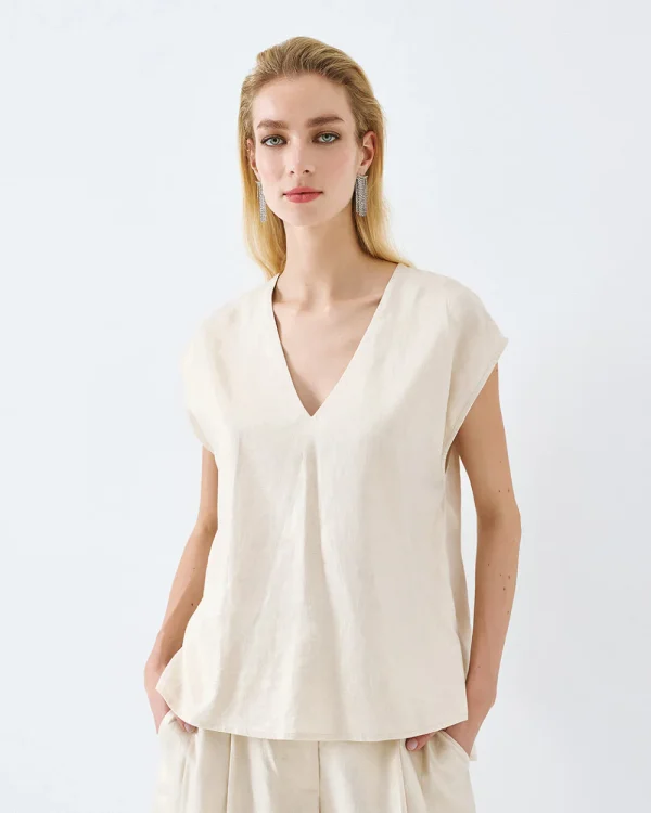 Metallic top with belt
- Access Fashion